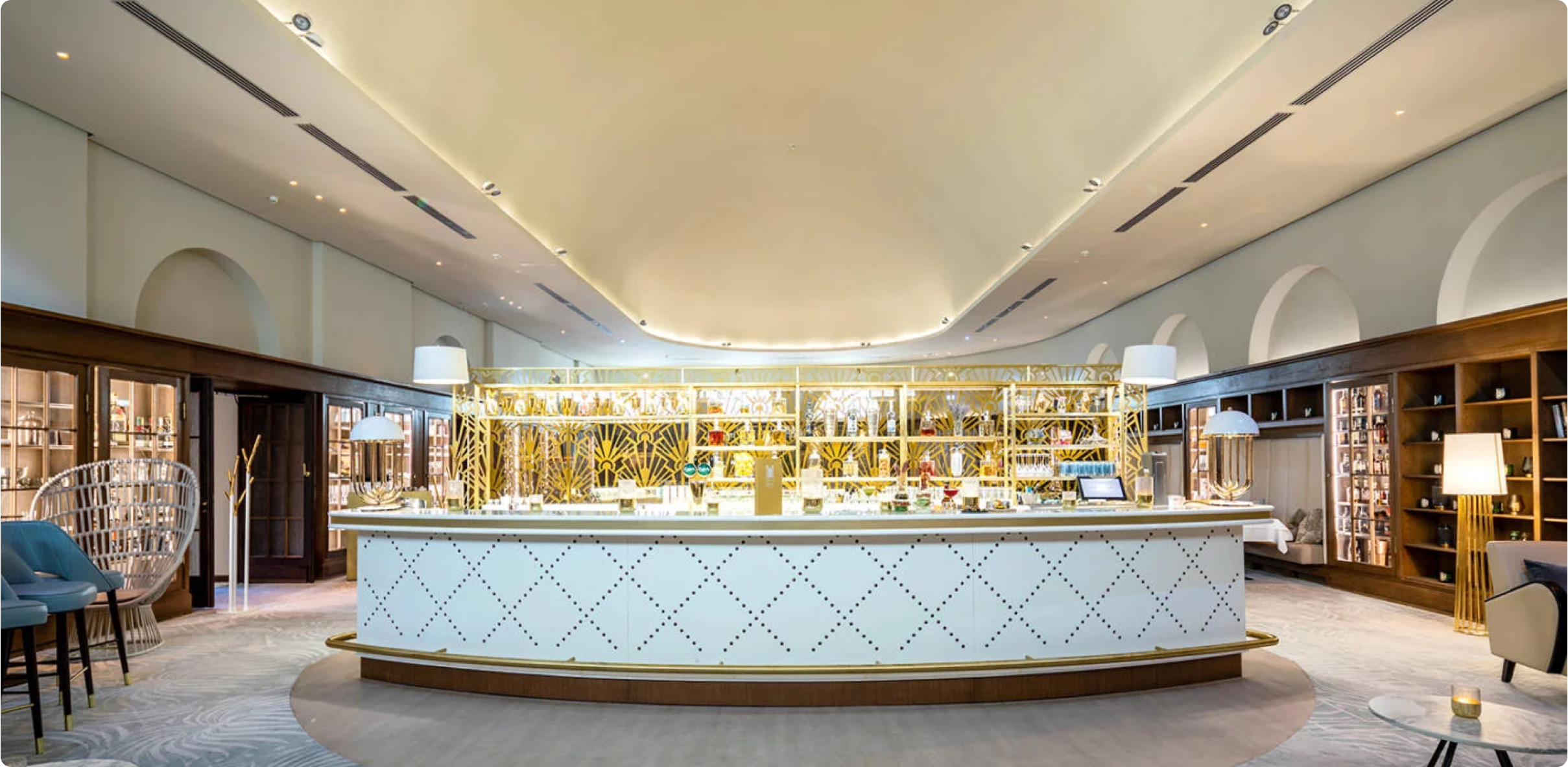 A spacious bar with a curved counter.